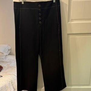 Anthropologie Black pants with gold stripes and a 24 inch inseam